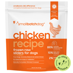 Package of smallbatchdog chicken recipe frozen raw sliders for dogs with branding and product details.