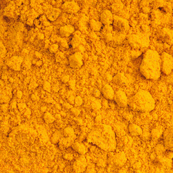 Close up view of organic turmeric powder.