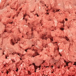 Close up view of raw ground duck with bone.