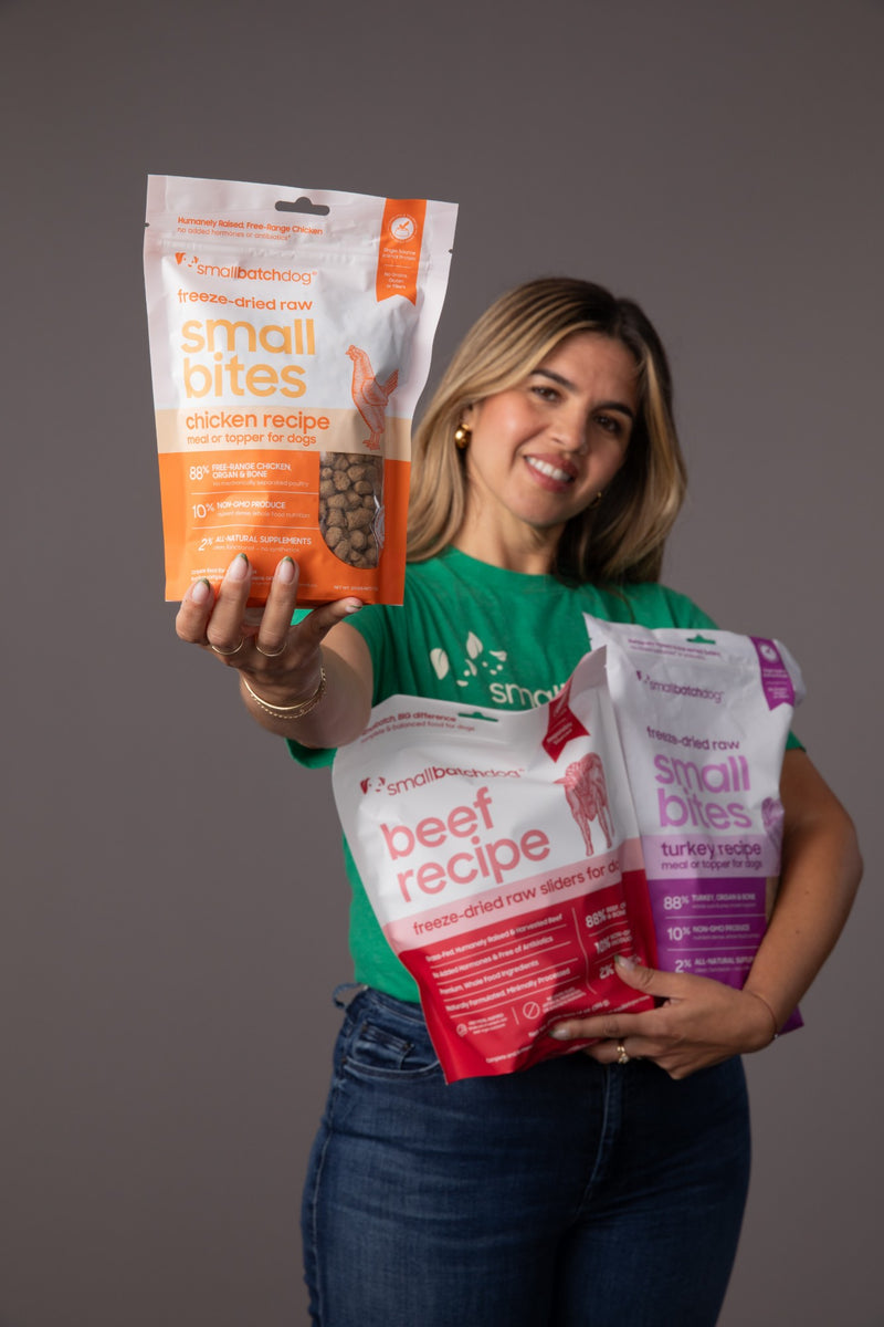 Smallbatch co-founder holding bags of freeze-dried Small Bites and Beef Sliders